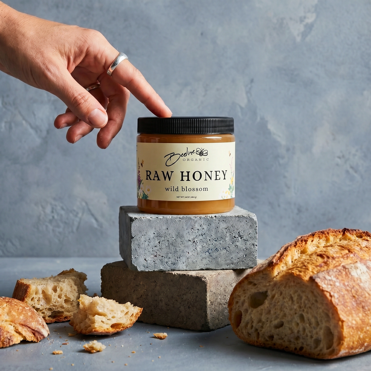 16-ounce Wild Blossom raw honey jar from Beeline Organic Honey
