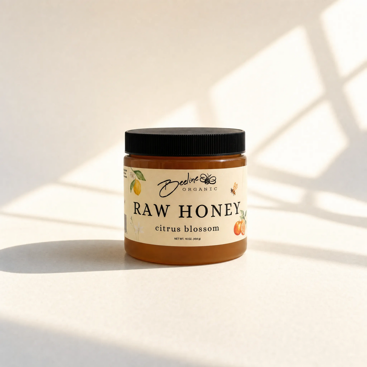 Raw citrus blossom honey 16oz jar — pure unfiltered California honey from Fresno orange lemon lime and tangerine groves